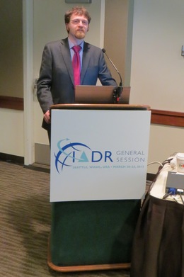 Andrew Creese giving an oral presentation at IADR2013 Seattle